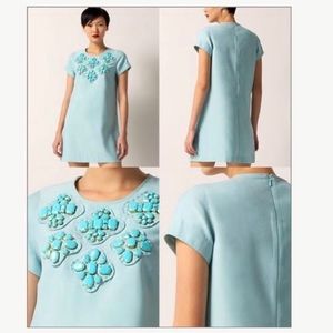 Aqua shift dress with turquoise stone emblements. Size m. Worn once.
